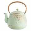 World Market Light Green Embossed Cast Iron Teapot